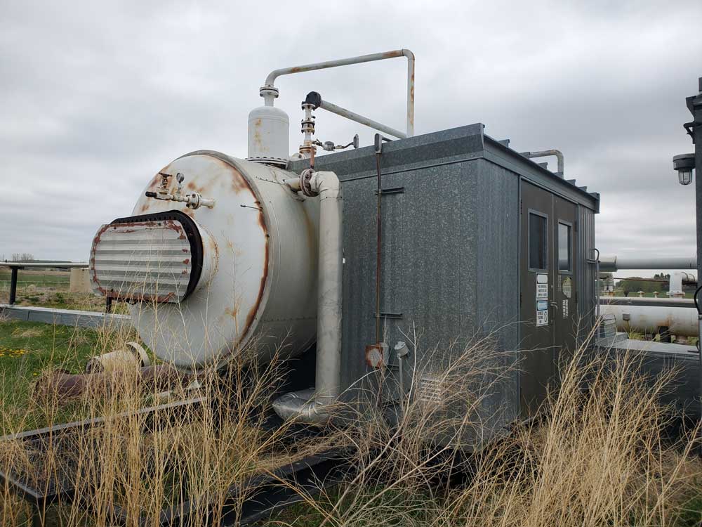 A compressor building located on the Innisfail facility before surface reclamation was conducted