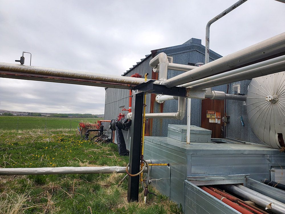 A building and piping that were removed from the Innisfail site during lease reclamation