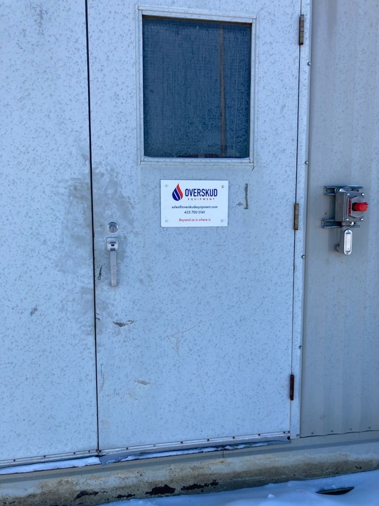 Our Overskud Equipment branding fastened to the compressor door